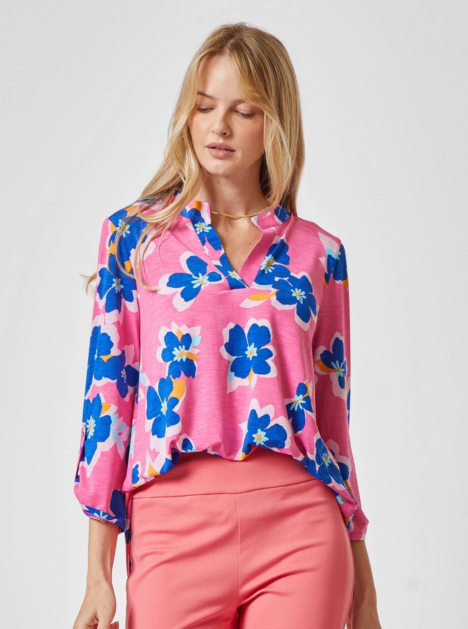 3/4 sleeve lizzy blouse from dear scarlett.  winkle free great for travel.  Pink with Funky Blue Flowers.  Hawaiian Shirt Feel.  70s Feel Blouse. 