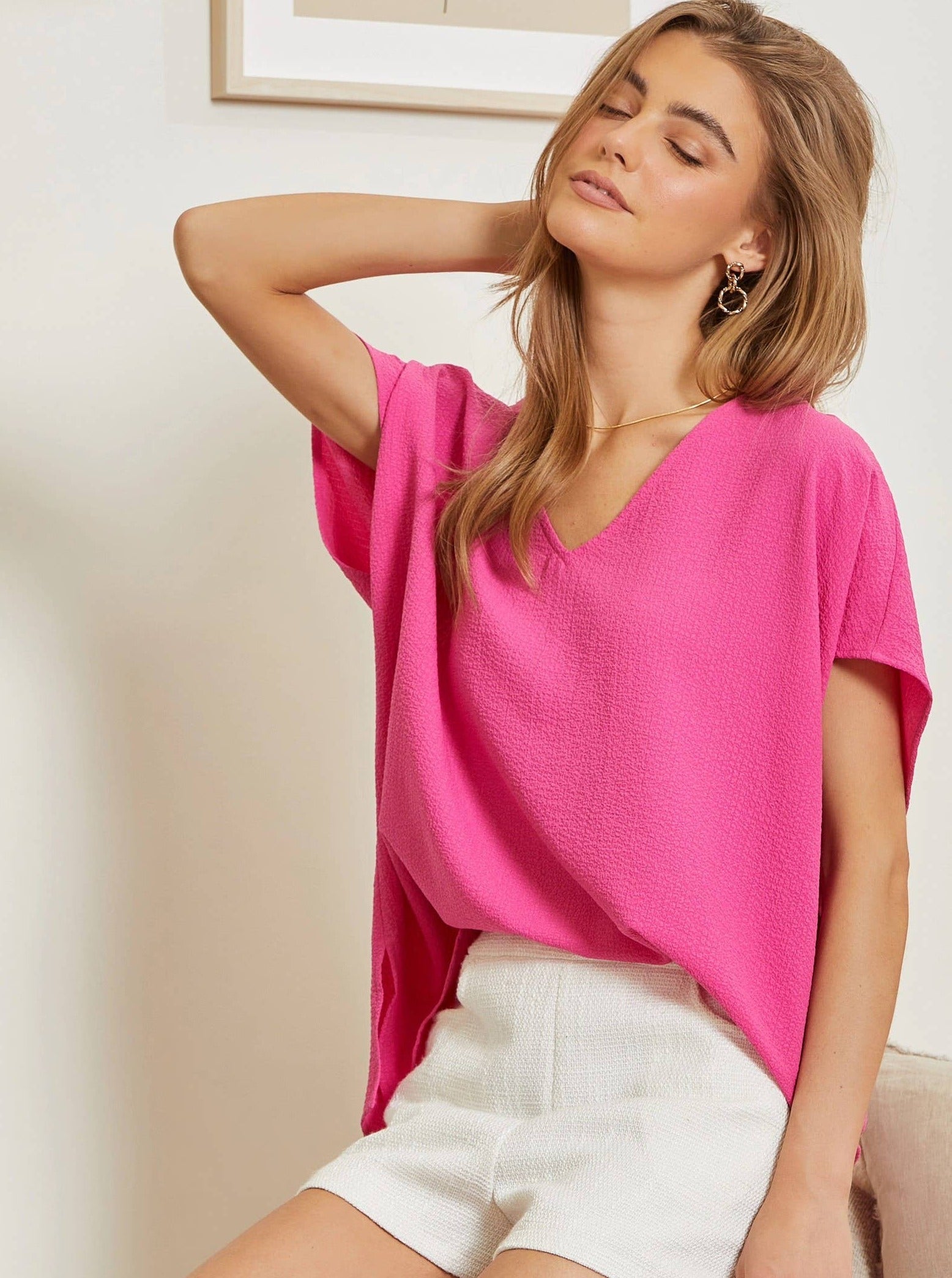 hot pink, short sleeve, dolman sleeve, v-neck blouse.  andree by unit brand.  flowy and flattering.